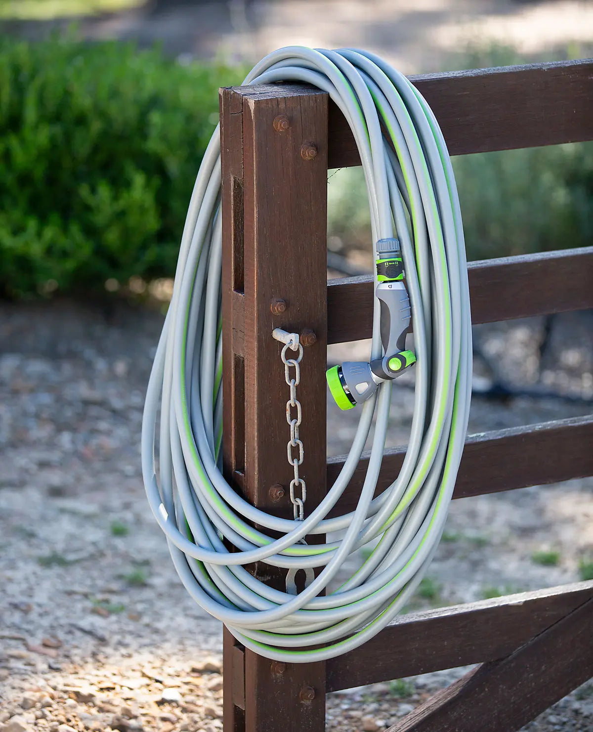 Aussie Gardener Dream Hose on wooden gate